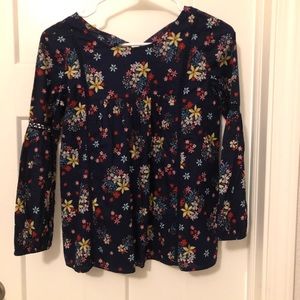 Gap navy blue flowy top with floral detail.